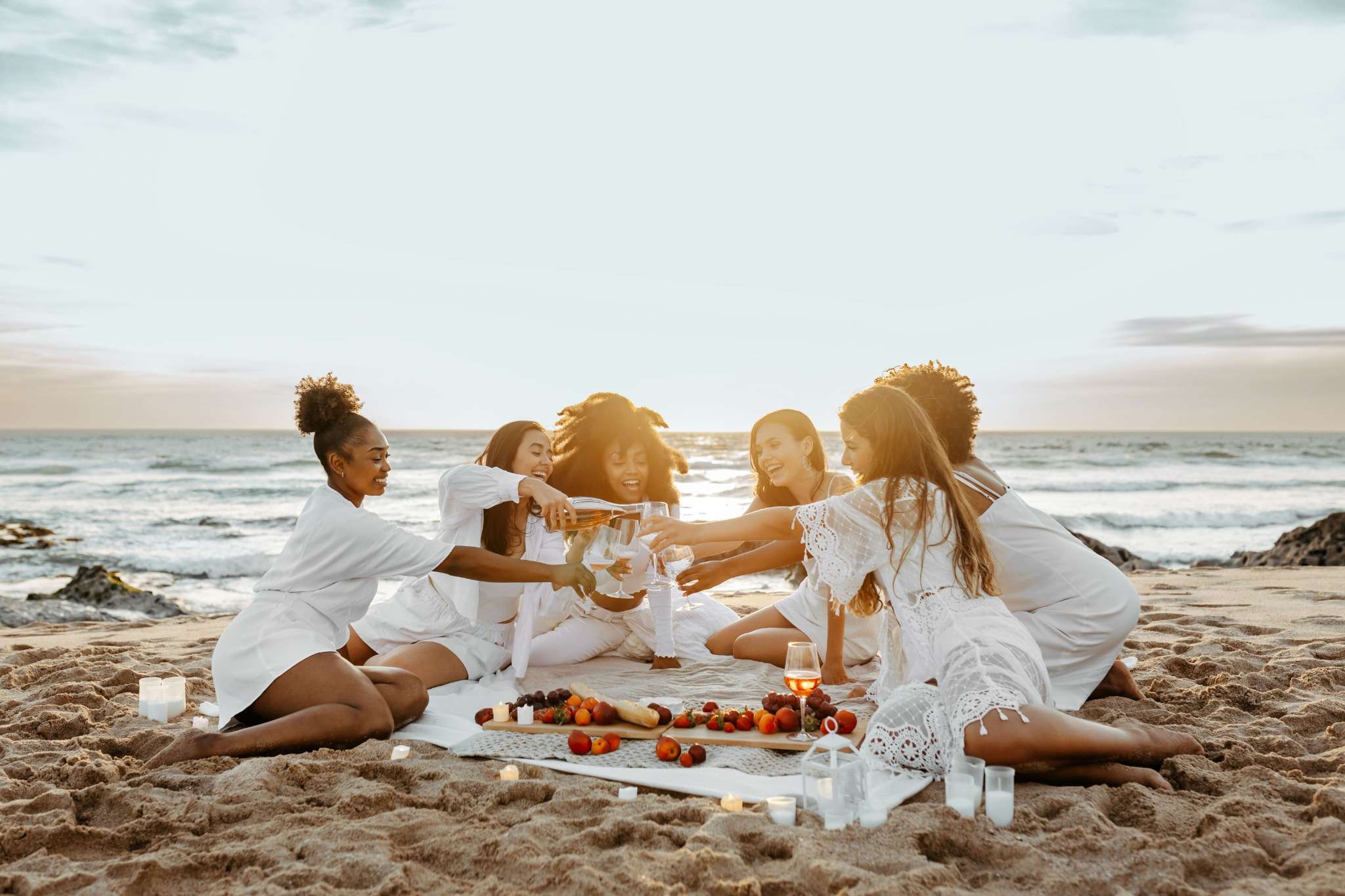 beautiful women in white picnic beach