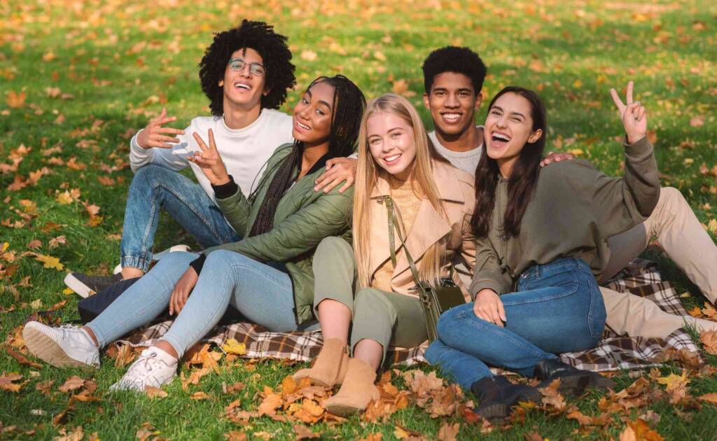 happy teenagers in garden
